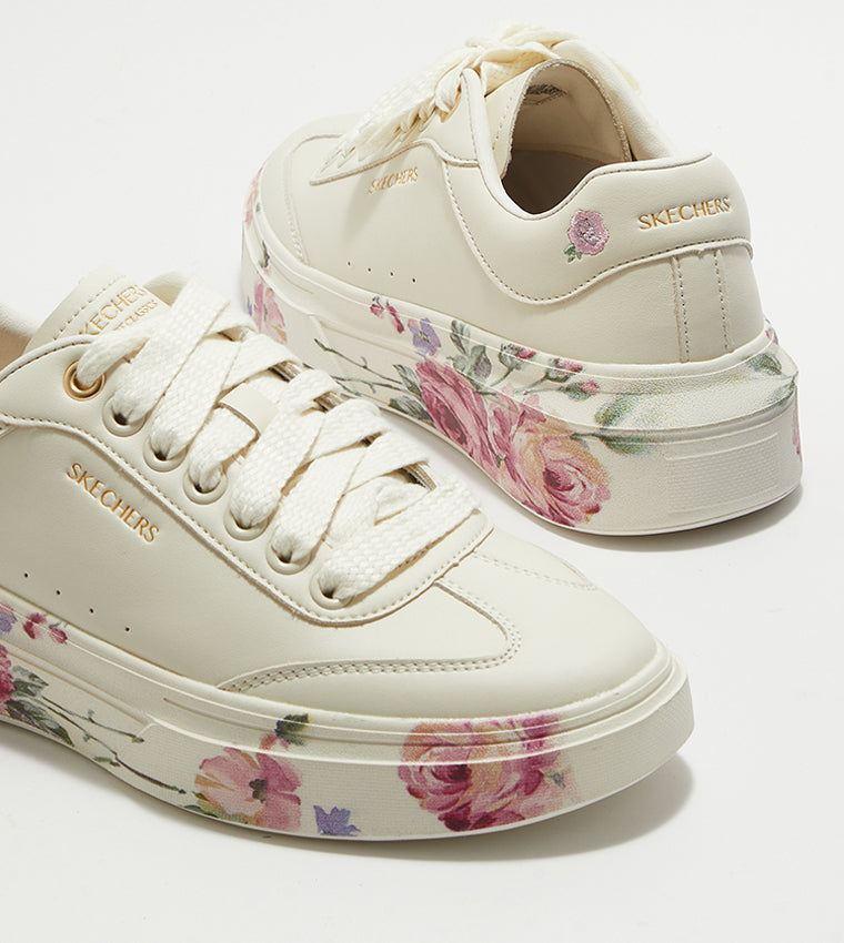 Pink skechers with flowers on sale